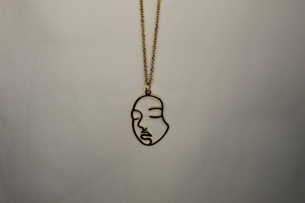 woman face necklace