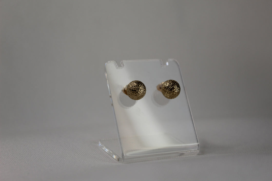 Gold earrings with sparkles