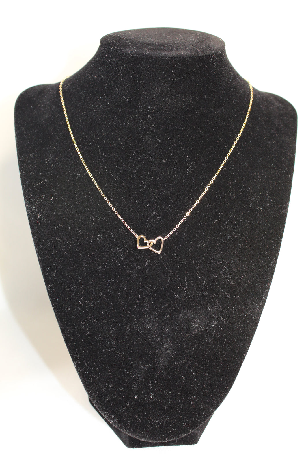 Intertwined hearts necklace